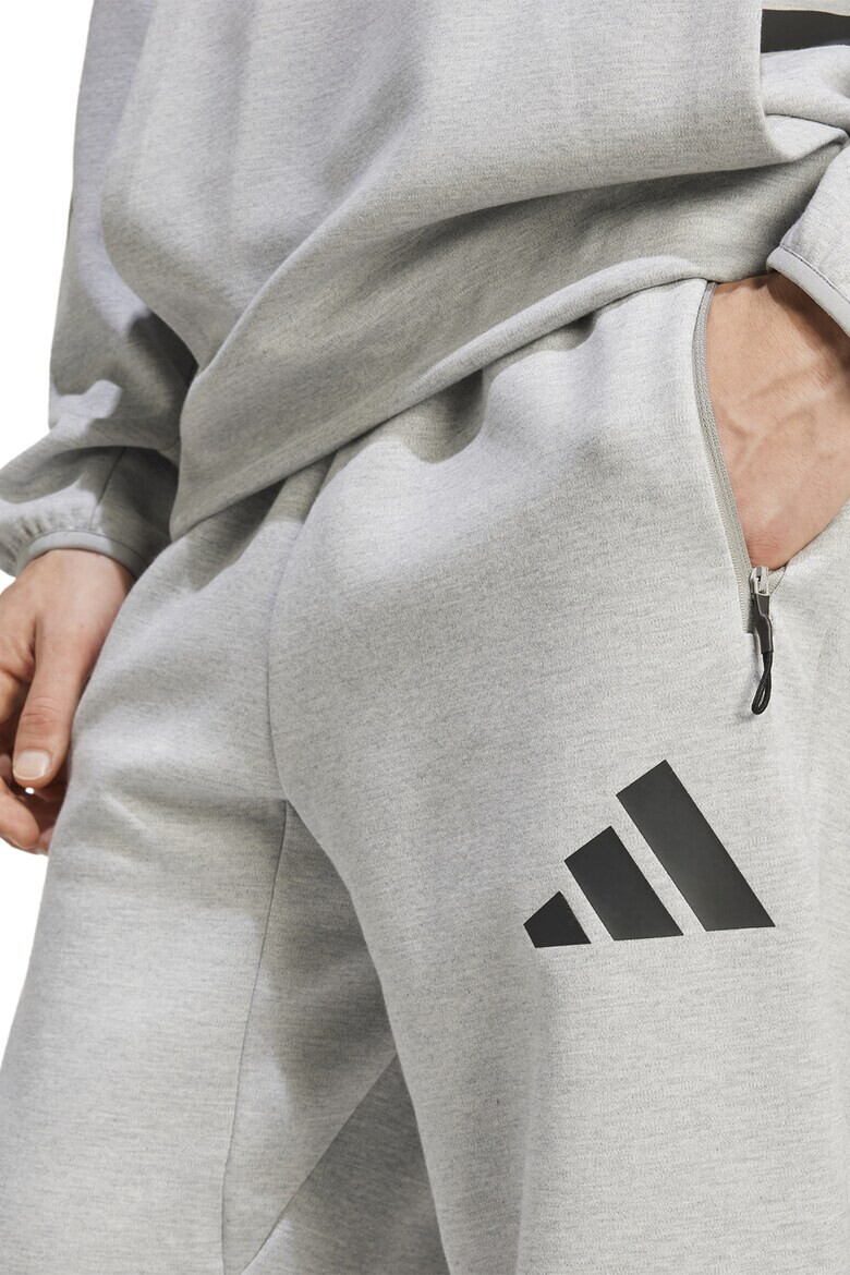 adidas Sportswear Спортен панталон Z.N.E. с джобове с цип - Pepit.bg