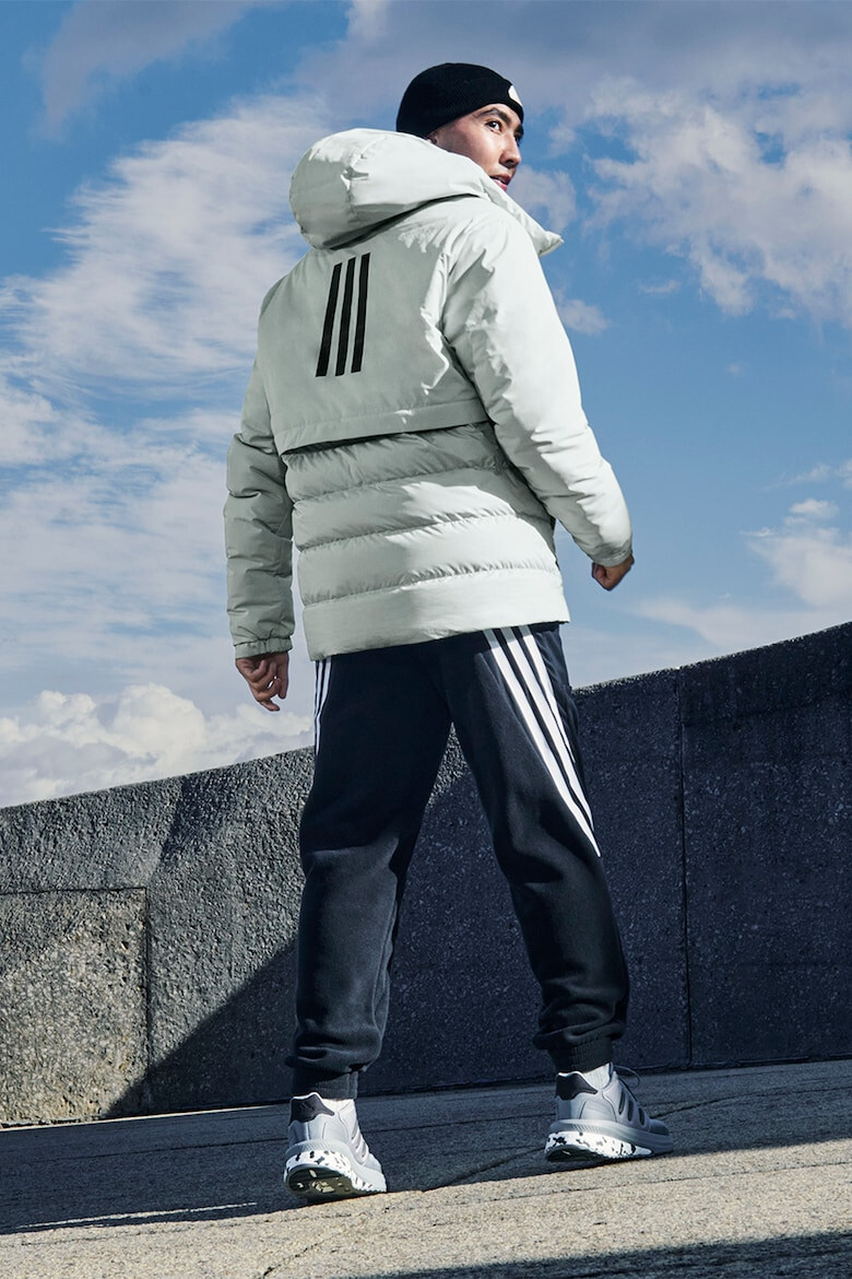 adidas Sportswear Зимно яке Traveer с пухена вата - Pepit.bg