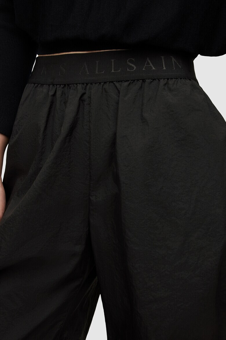 AllSaints Панталон с ниско дъно и еластични панели - Pepit.bg