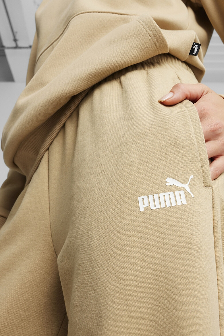 Puma Спортен панталон Essetials+ със свободна кройка и лого - Pepit.bg