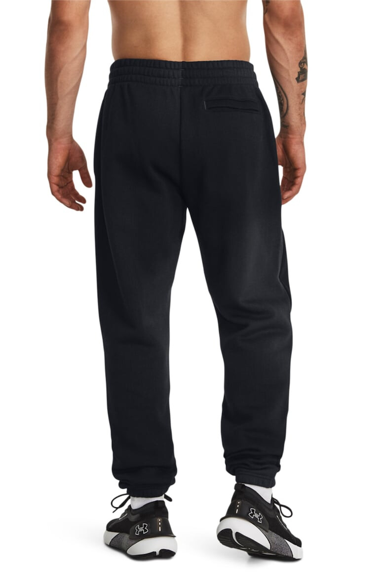 Under Armour Фитнес панталон Essential с лого - Pepit.bg