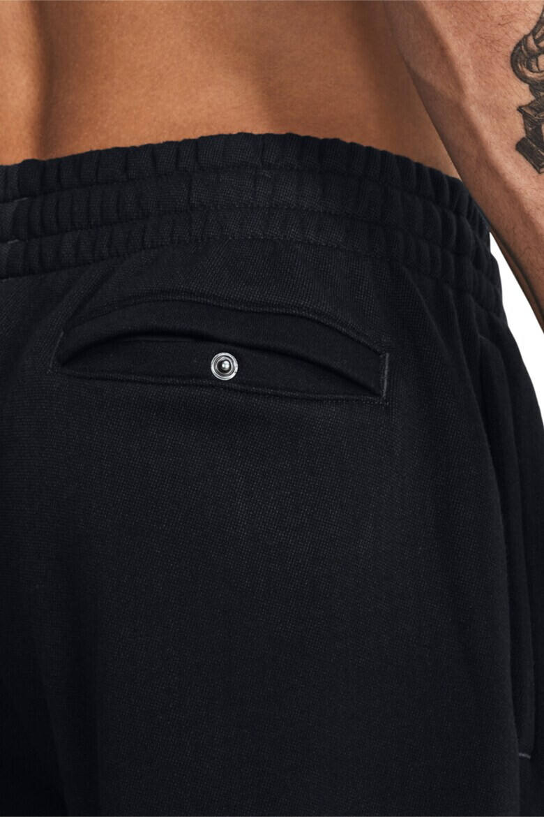 Under Armour Фитнес панталон Essential с лого - Pepit.bg