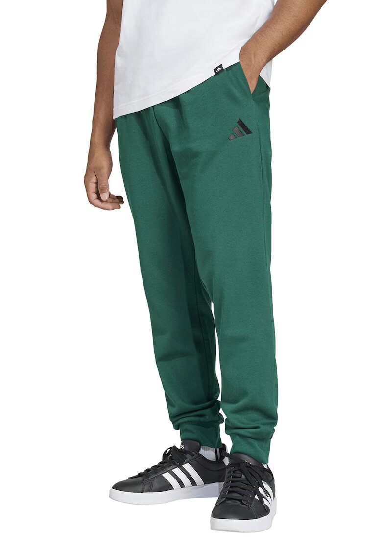 adidas Sportswear Скосен спортен панталон FeelCozy с връзка - Зелен/Черен