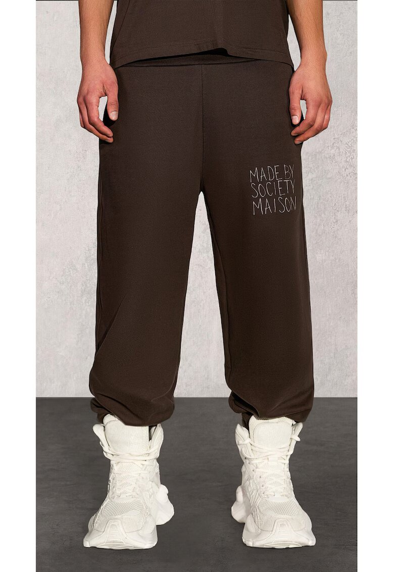 Made By Society Pantaloni de trening cu imprimeu logo Burnt