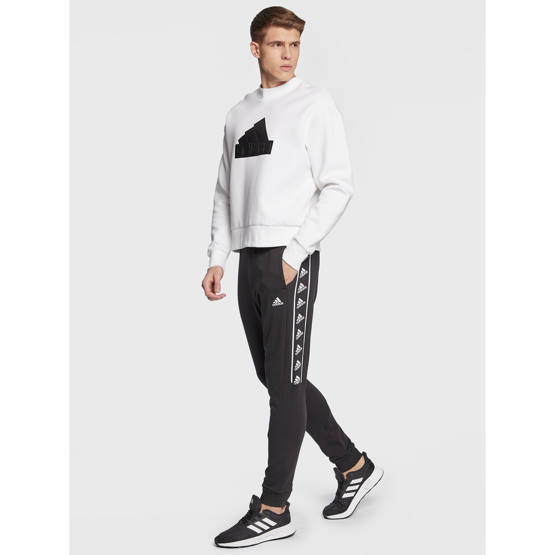 adidas Долнище анцуг Brandlove IC6795 Черен Regular Fit - Pepit.bg