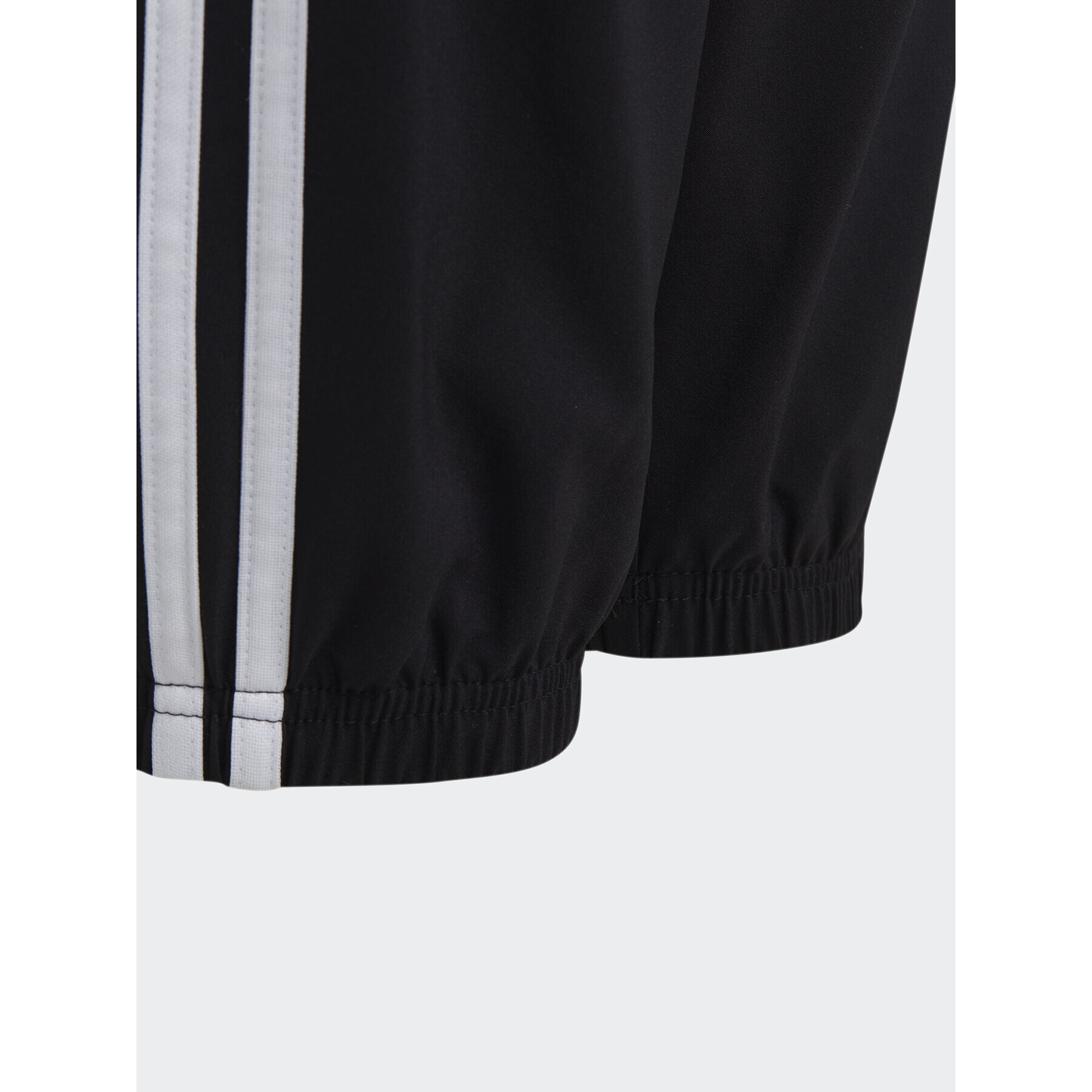 adidas Долнище анцуг Essentials 3-Stripes Woven Tracksuit Bottoms HR6334 Черен Slim Fit - Pepit.bg