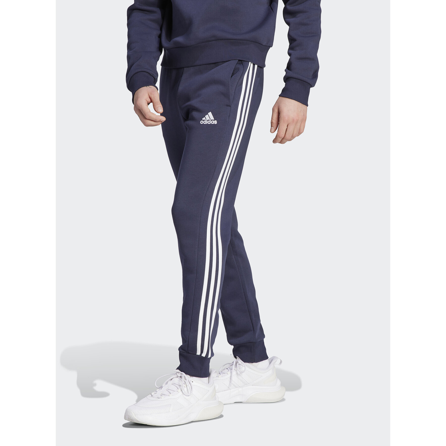 adidas Долнище анцуг Essentials Fleece 3-Stripes Cuff IJ6493 Тъмносин Regular Fit - Pepit.bg