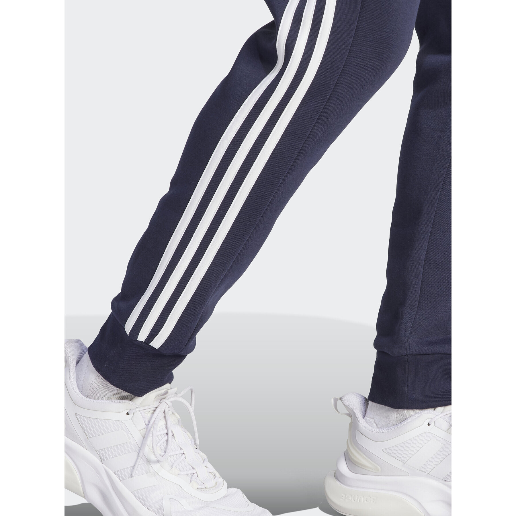 adidas Долнище анцуг Essentials Fleece 3-Stripes Cuff IJ6493 Тъмносин Regular Fit - Pepit.bg