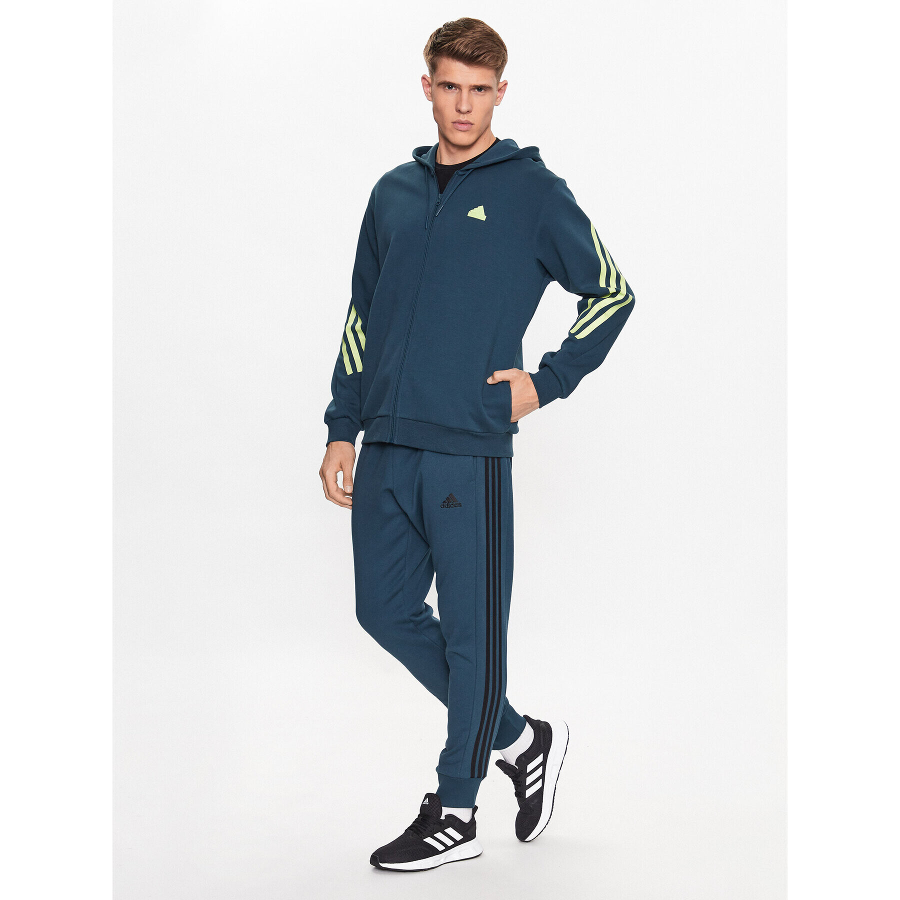 adidas Долнище анцуг Essentials French Terry Tapered Cuff 3-Stripes Joggers IJ8698 Електриков Regular Fit - Pepit.bg