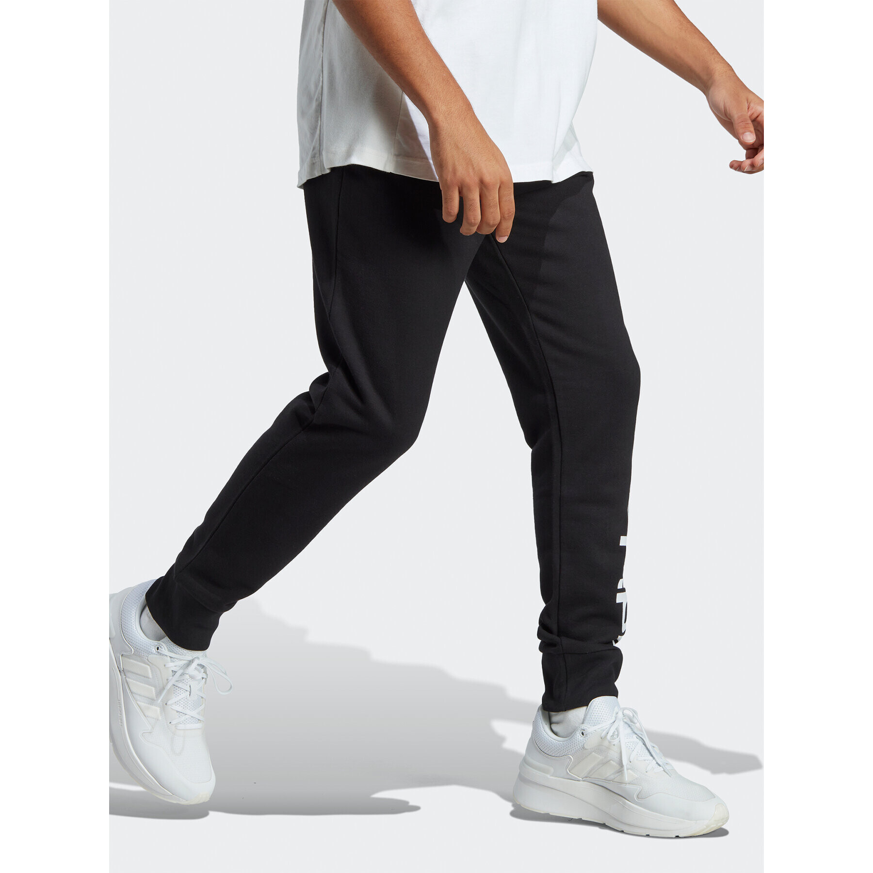 adidas Долнище анцуг Essentials French Terry Tapered Cuff Logo Joggers IC0063 Черен Regular Fit - Pepit.bg