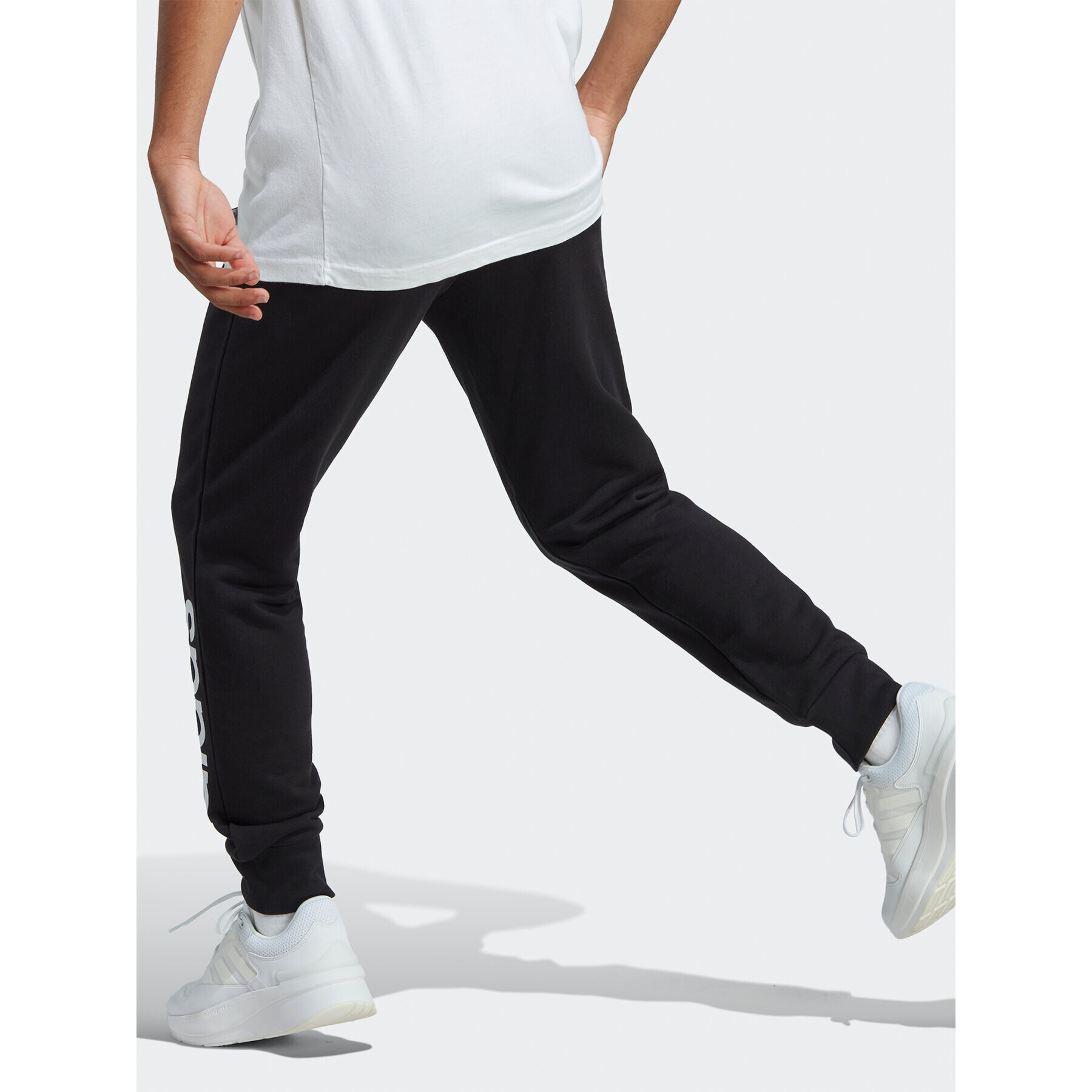 adidas Долнище анцуг Essentials French Terry Tapered Cuff Logo Joggers IC0063 Черен Regular Fit - Pepit.bg