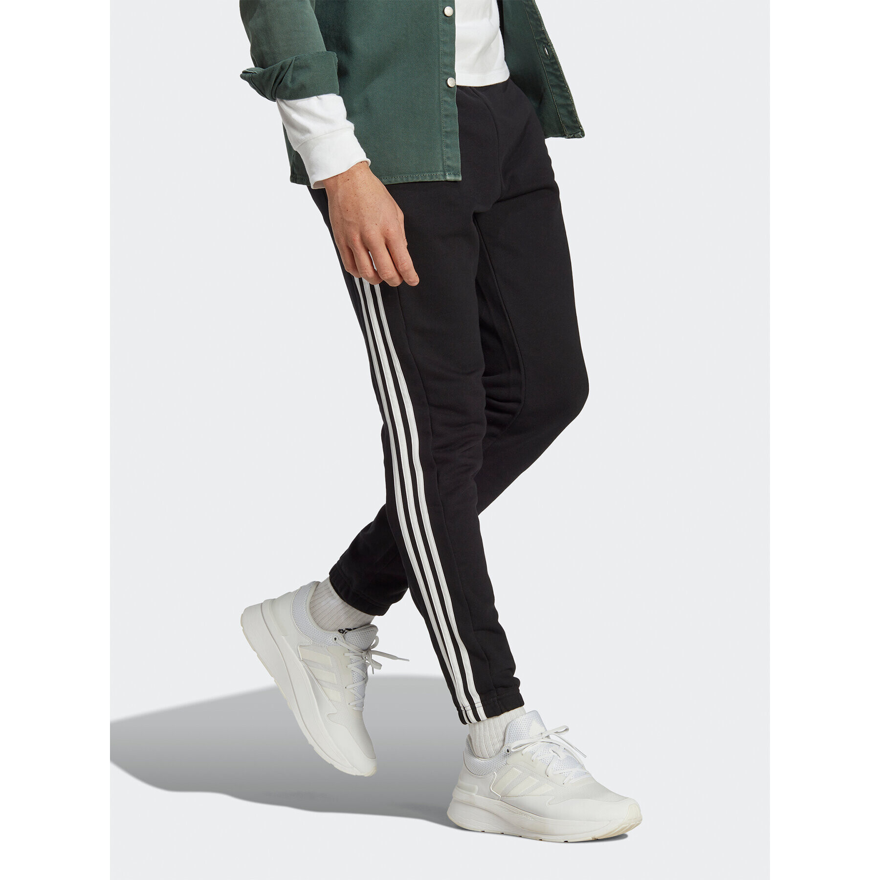 adidas Долнище анцуг Essentials French Terry Tapered Elastic Cuff 3-Stripes Joggers IC0050 Черен Regular Fit - Pepit.bg