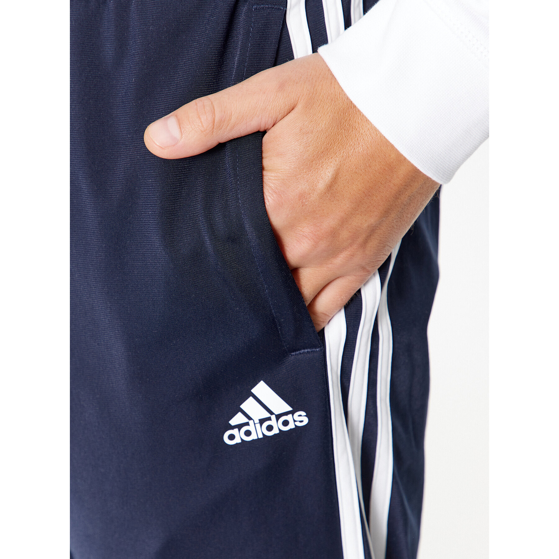 adidas Долнище анцуг Essentials Warm-Up 3-Stripes H46106 Тъмносин Regular Fit - Pepit.bg
