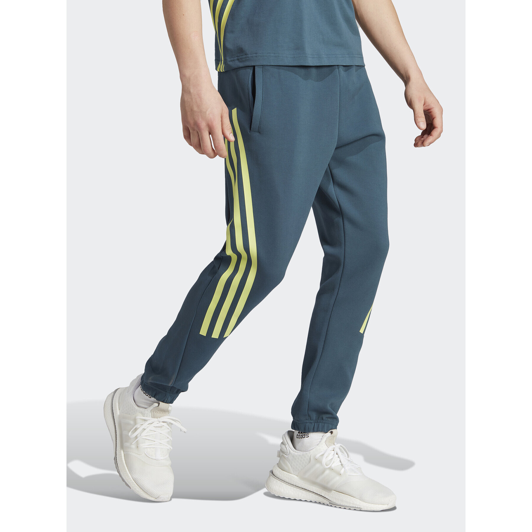 adidas Долнище анцуг Future Icons 3-Stripes Joggers IJ6372 Електриков Slim Fit - Pepit.bg