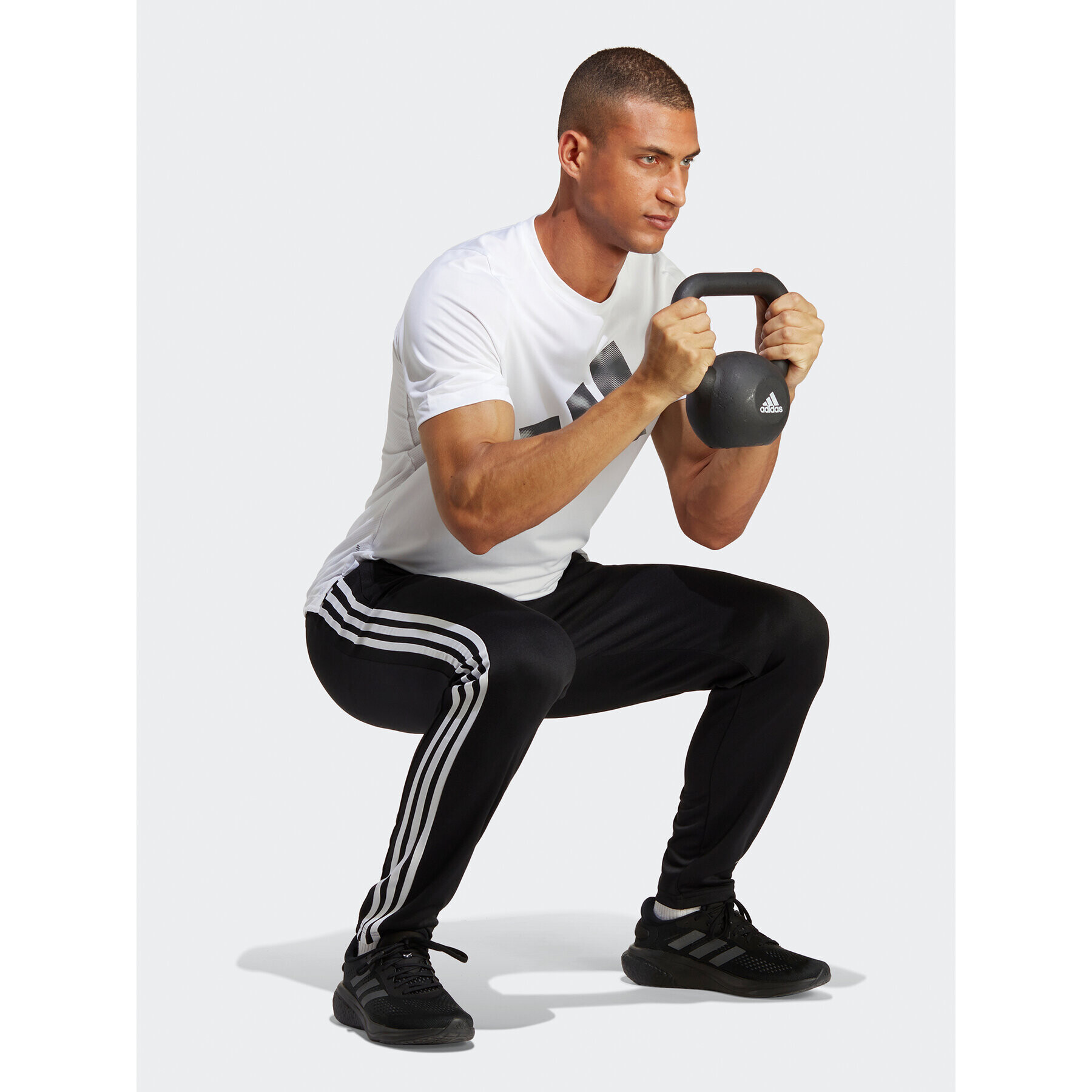 adidas Долнище анцуг Train Essentials 3-Stripes Training IB8168 Черен Regular Fit - Pepit.bg