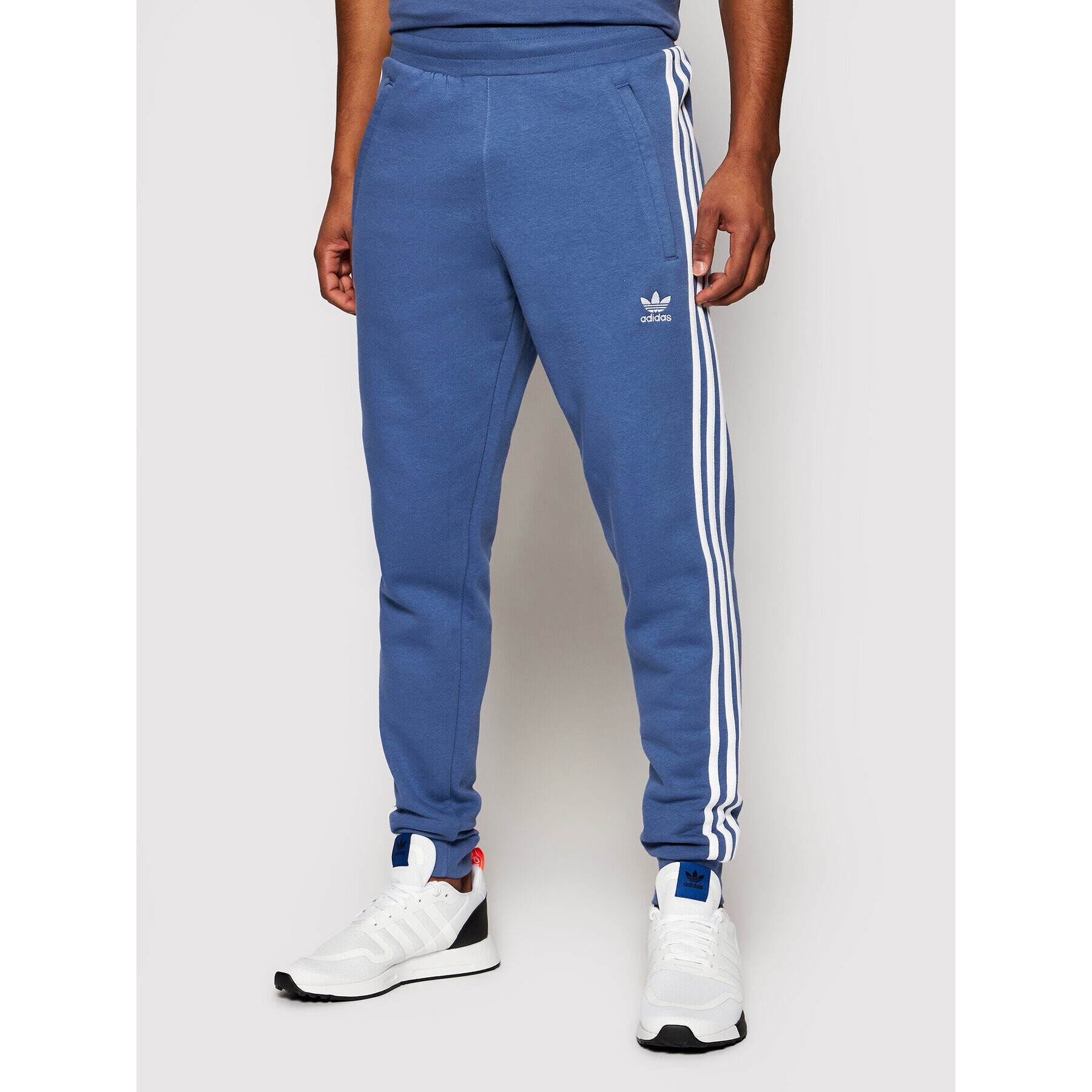 adidas Долнище анцуг adicolor Classics 3-Stripes GN3528 Син Slim Fit - Pepit.bg