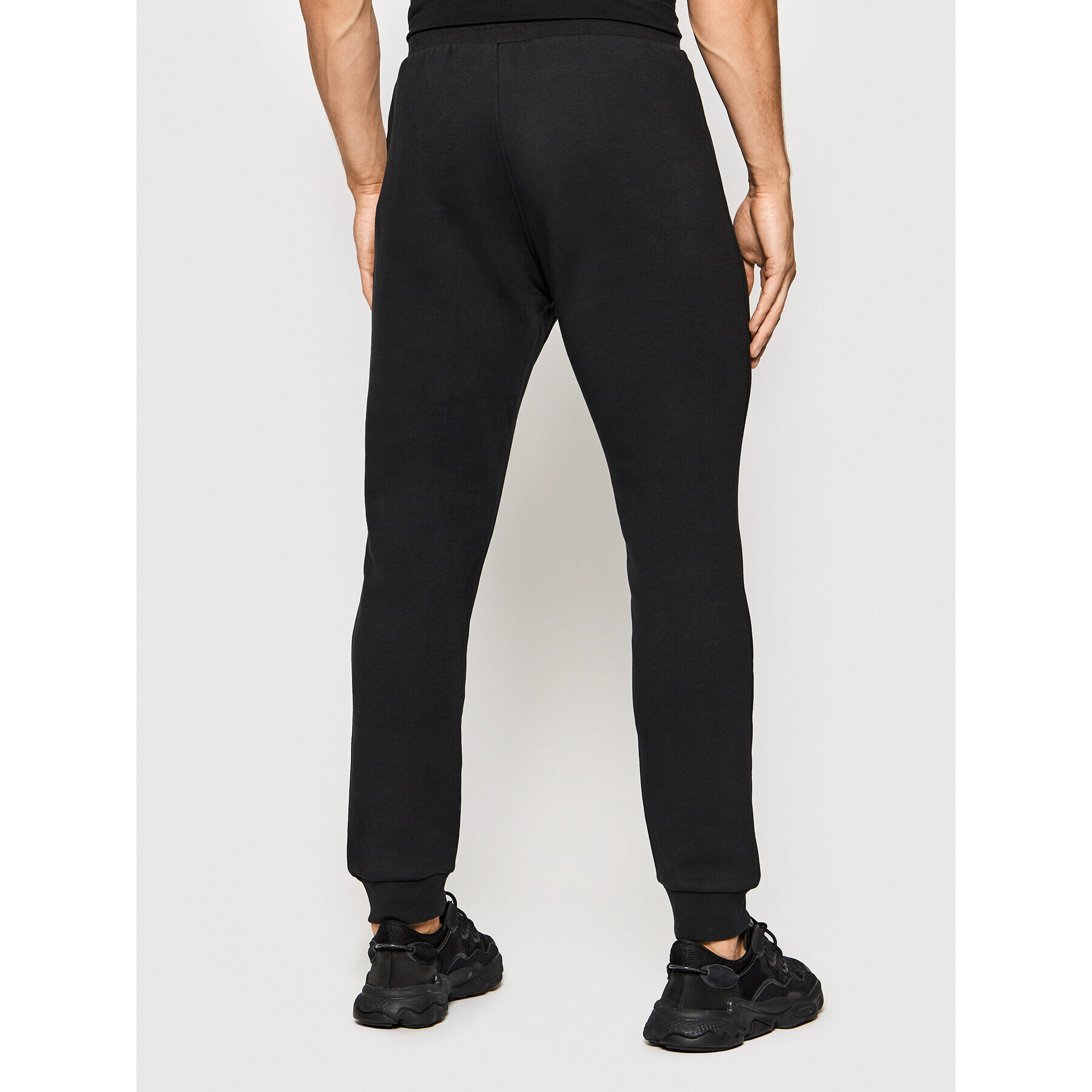 adidas Долнище анцуг adicolor Essentials Trefoil H34657 Черен Slim Fit - Pepit.bg