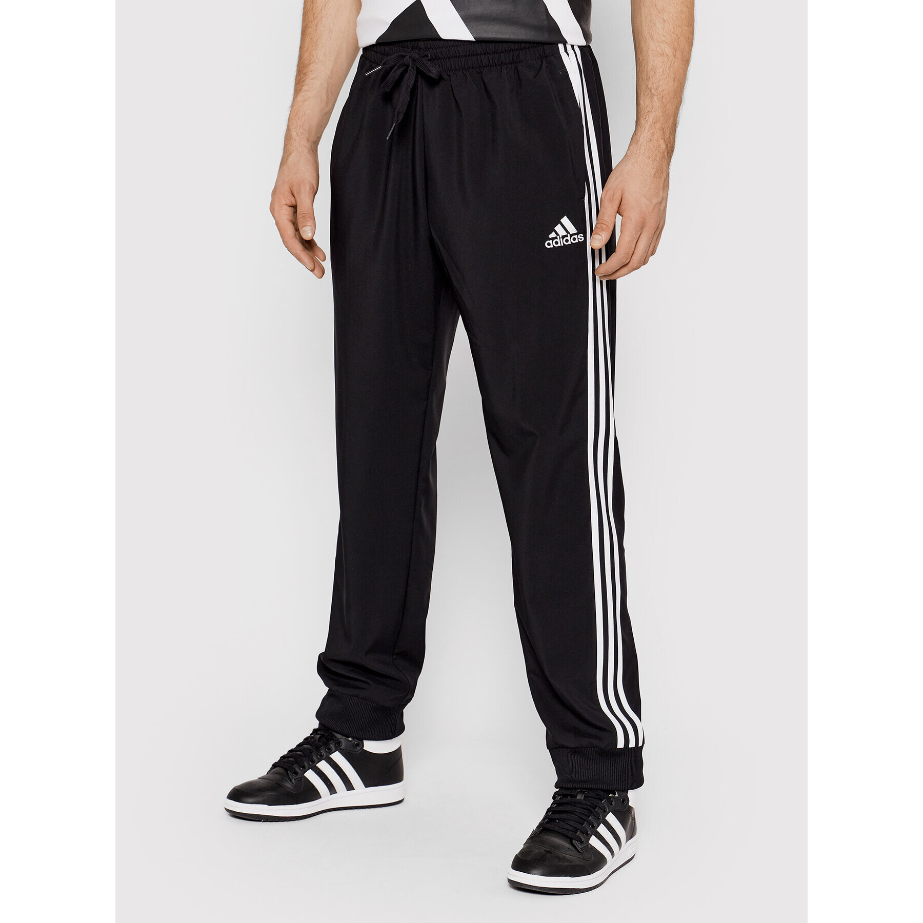 adidas Долнище анцуг Aeroready Essentials 3-Stripes GK8980 Черен Regular Fit - Pepit.bg