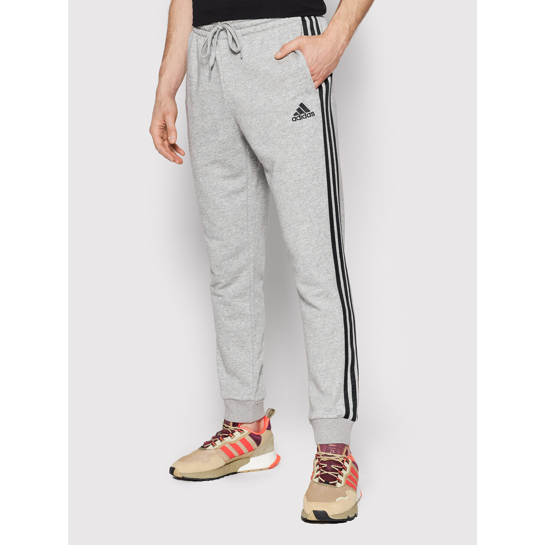 adidas Долнище анцуг Essentials French Terry GK8889 Сив Regular Fit - Pepit.bg