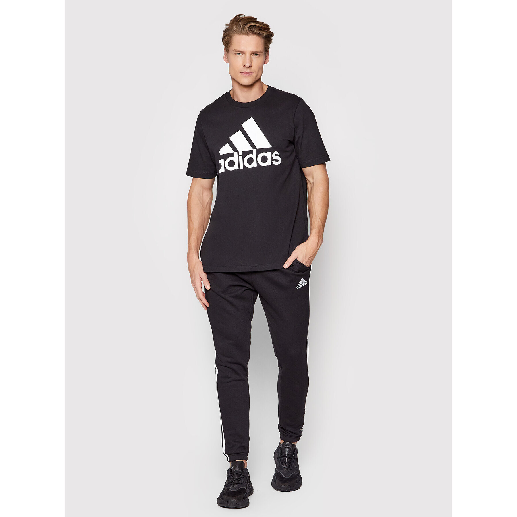 adidas Долнище анцуг Essentials GK8829 Черен Regular Fit - Pepit.bg