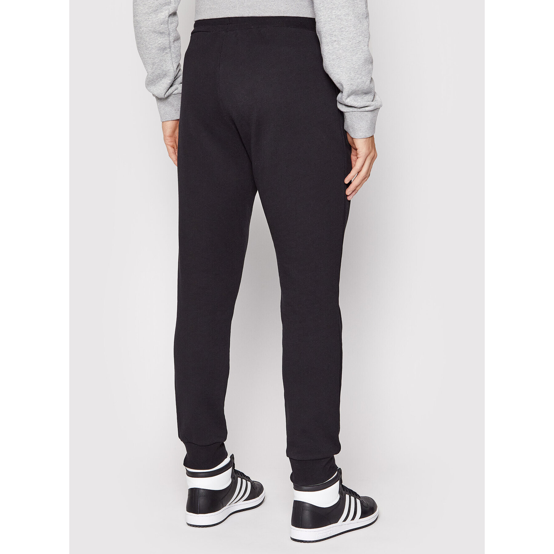 adidas Долнище анцуг Essentials HC5126 Черен Slim Fit - Pepit.bg