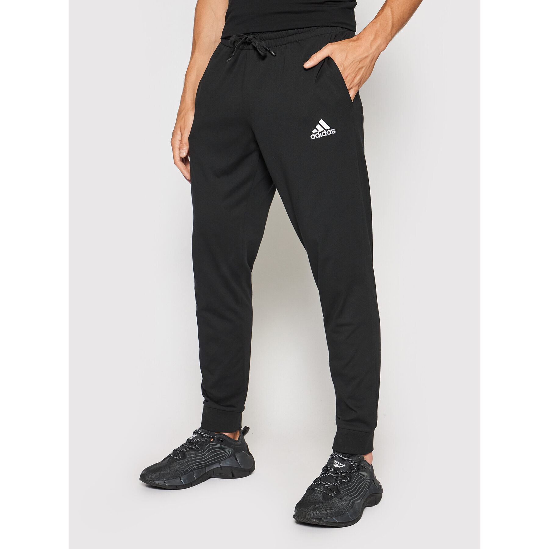adidas Performance Долнище анцуг Essentials Single GK9226 Черен Regular Fit - Pepit.bg
