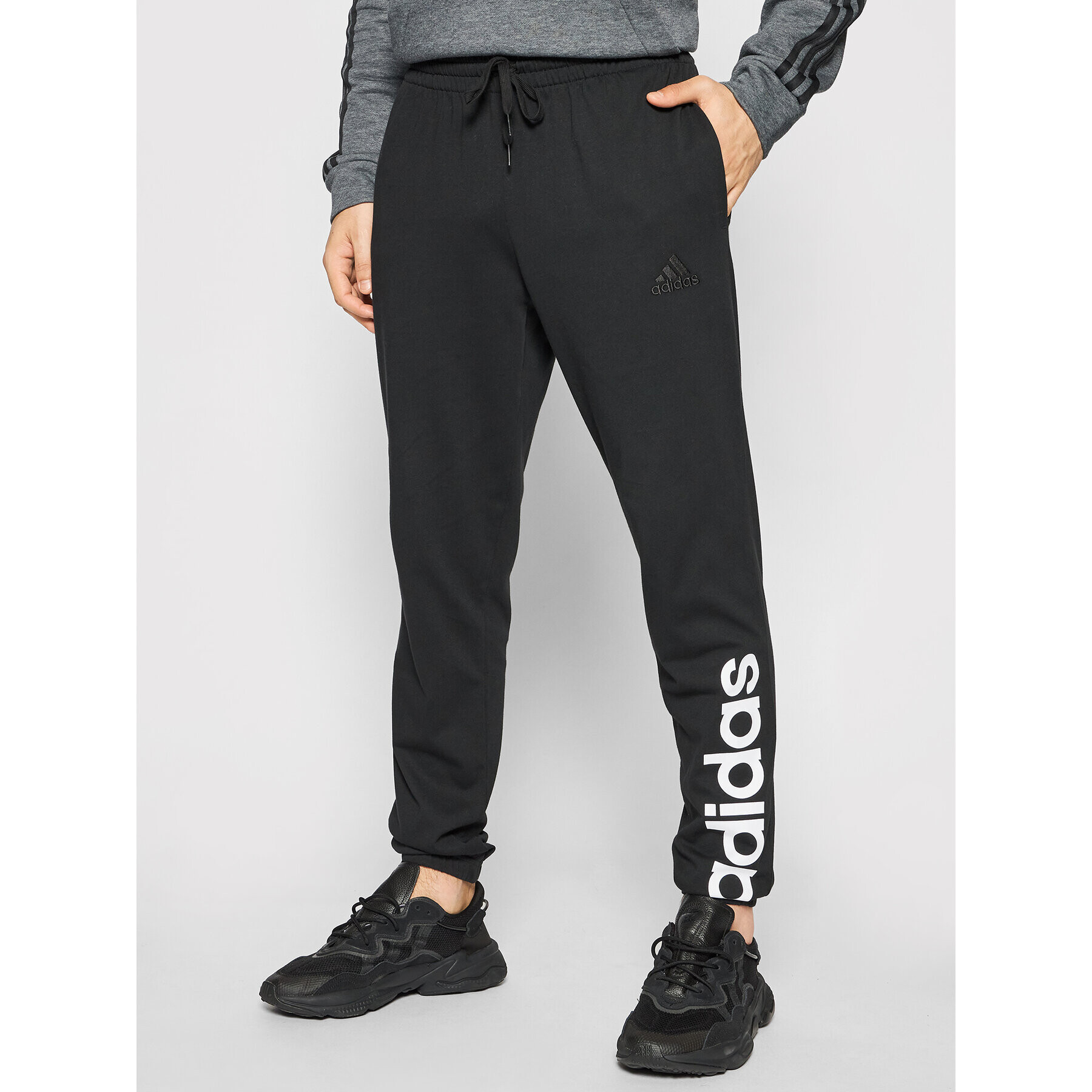 adidas Долнище анцуг Essentials Single Jersey GK8827 Черен Regular Fit - Pepit.bg