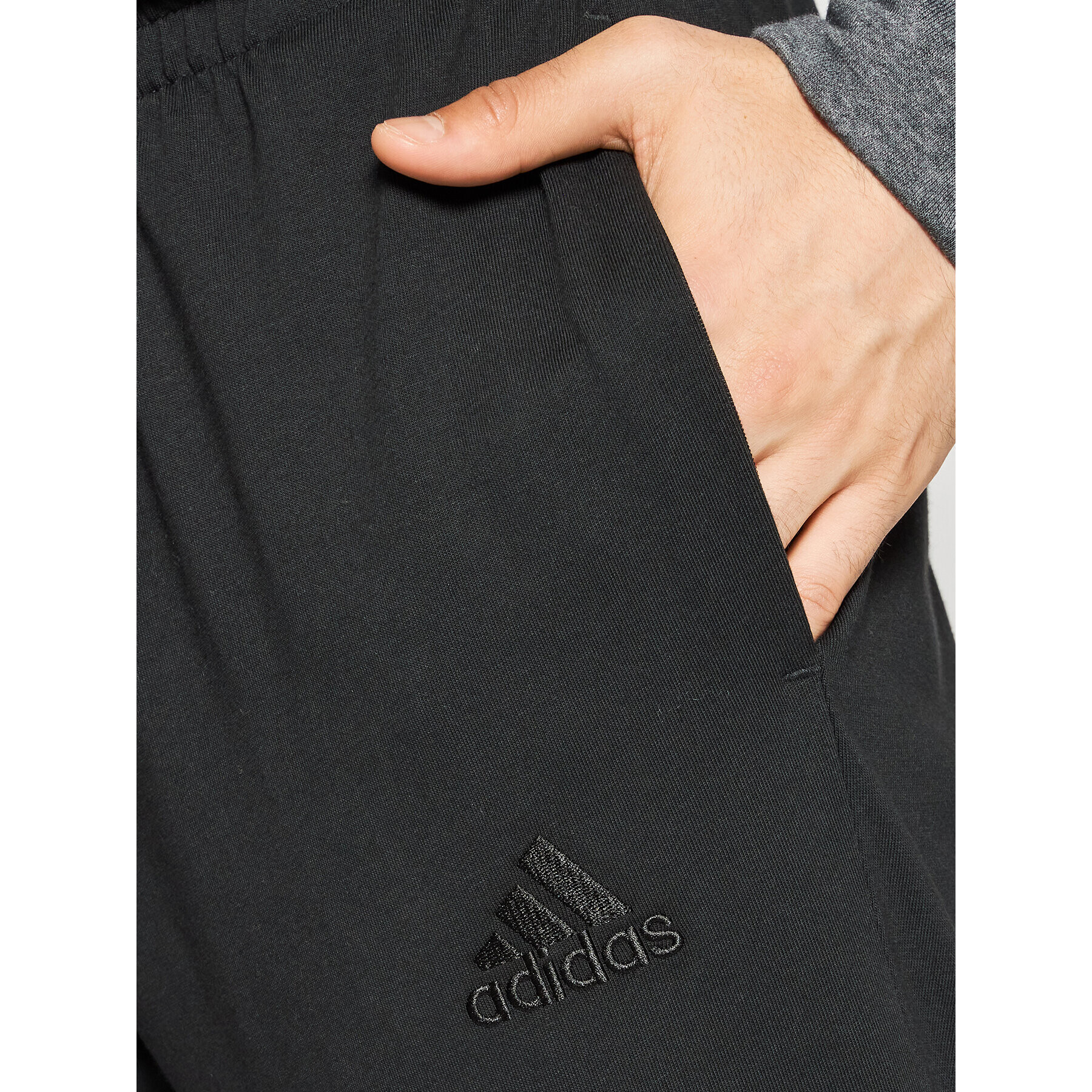 adidas Долнище анцуг Essentials Single Jersey GK8827 Черен Regular Fit - Pepit.bg