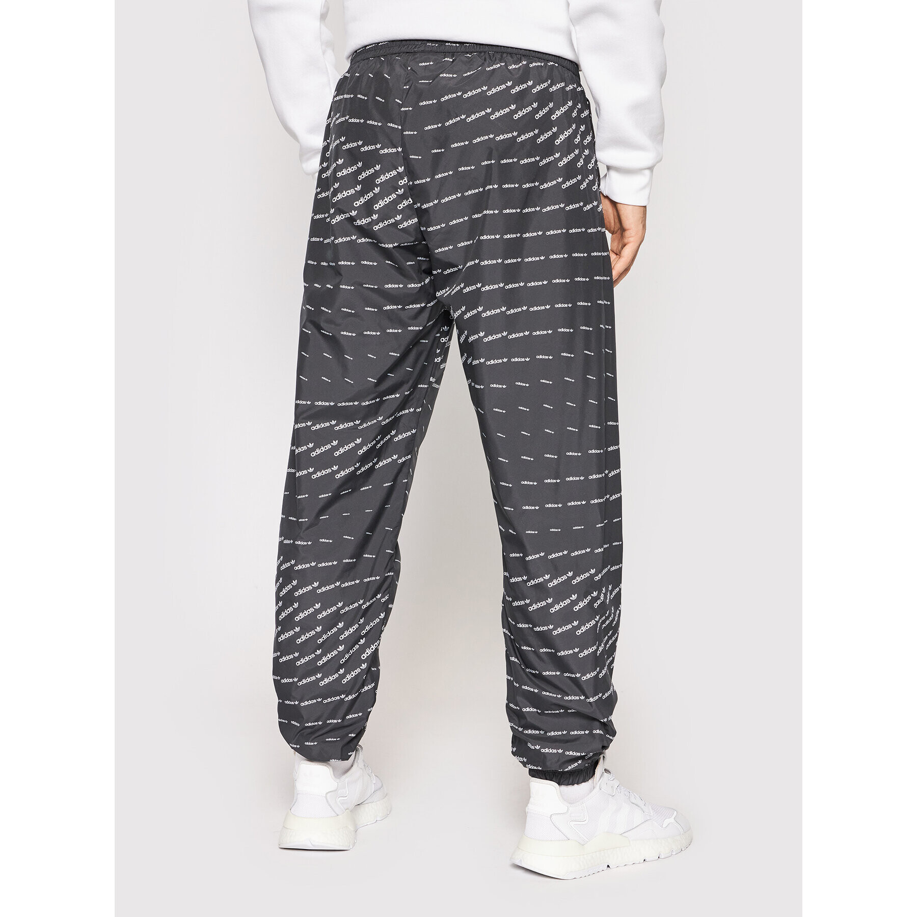 adidas Долнище анцуг Graphics Monogram H13484 Черен Regular Fit - Pepit.bg