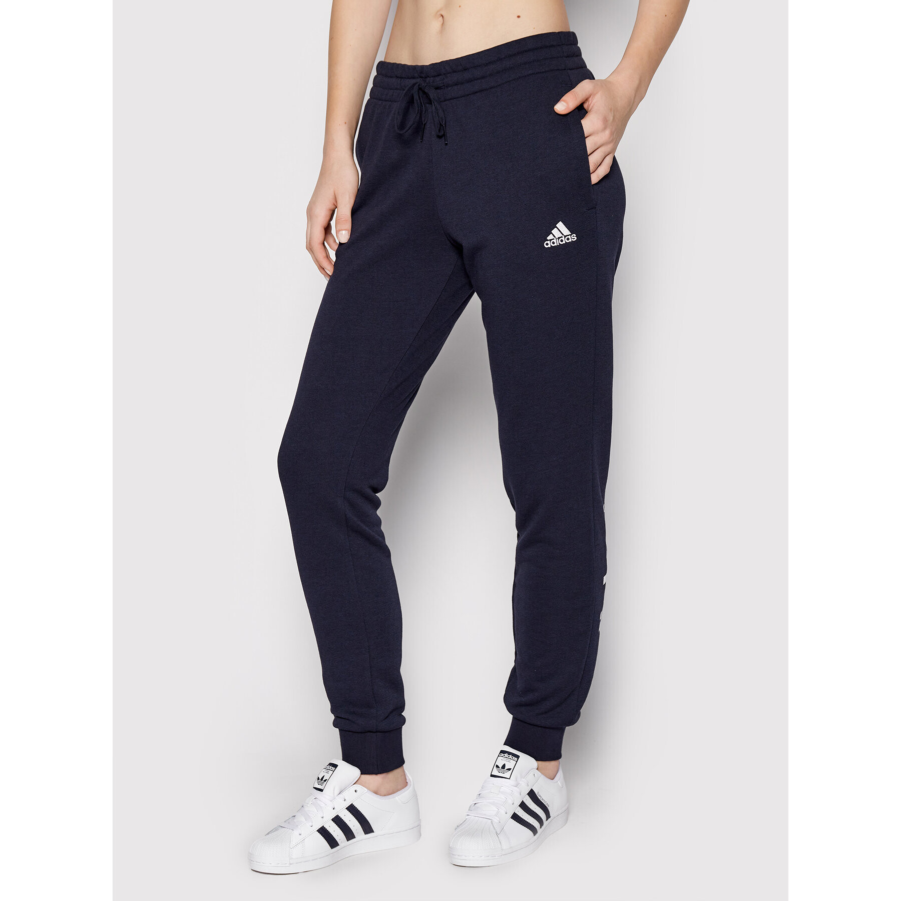 adidas Долнище анцуг Essentials French Terry Logo H07857 Тъмносин Slim Fit - Pepit.bg