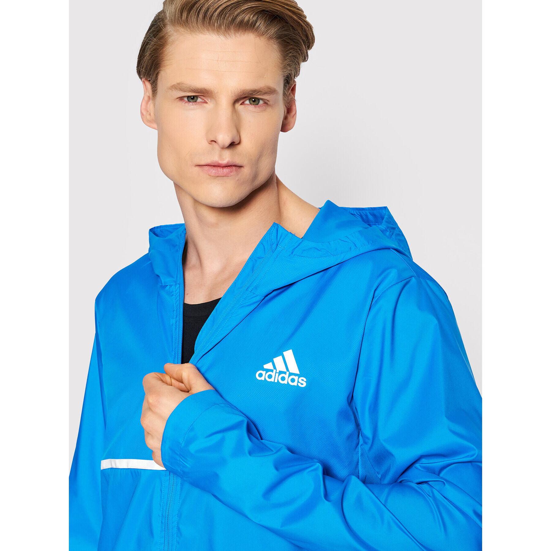 adidas Яке за джогинг Own the Run HB7426 Син Regular Fit - Pepit.bg