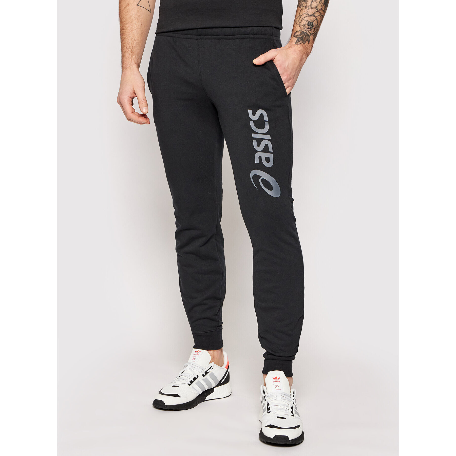 Asics Долнище анцуг Big Logo 2031A977 Черен Slim Fit - Pepit.bg