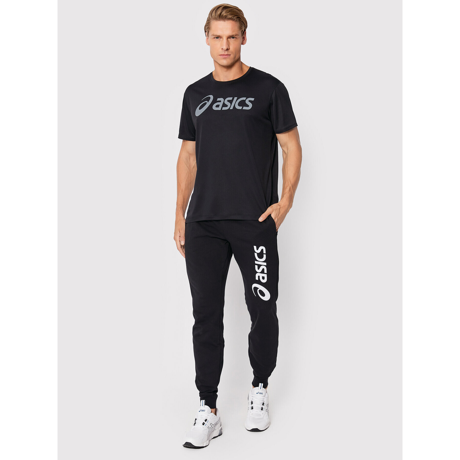 Asics Долнище анцуг Big Logo 2031A977 Черен Slim Fit - Pepit.bg