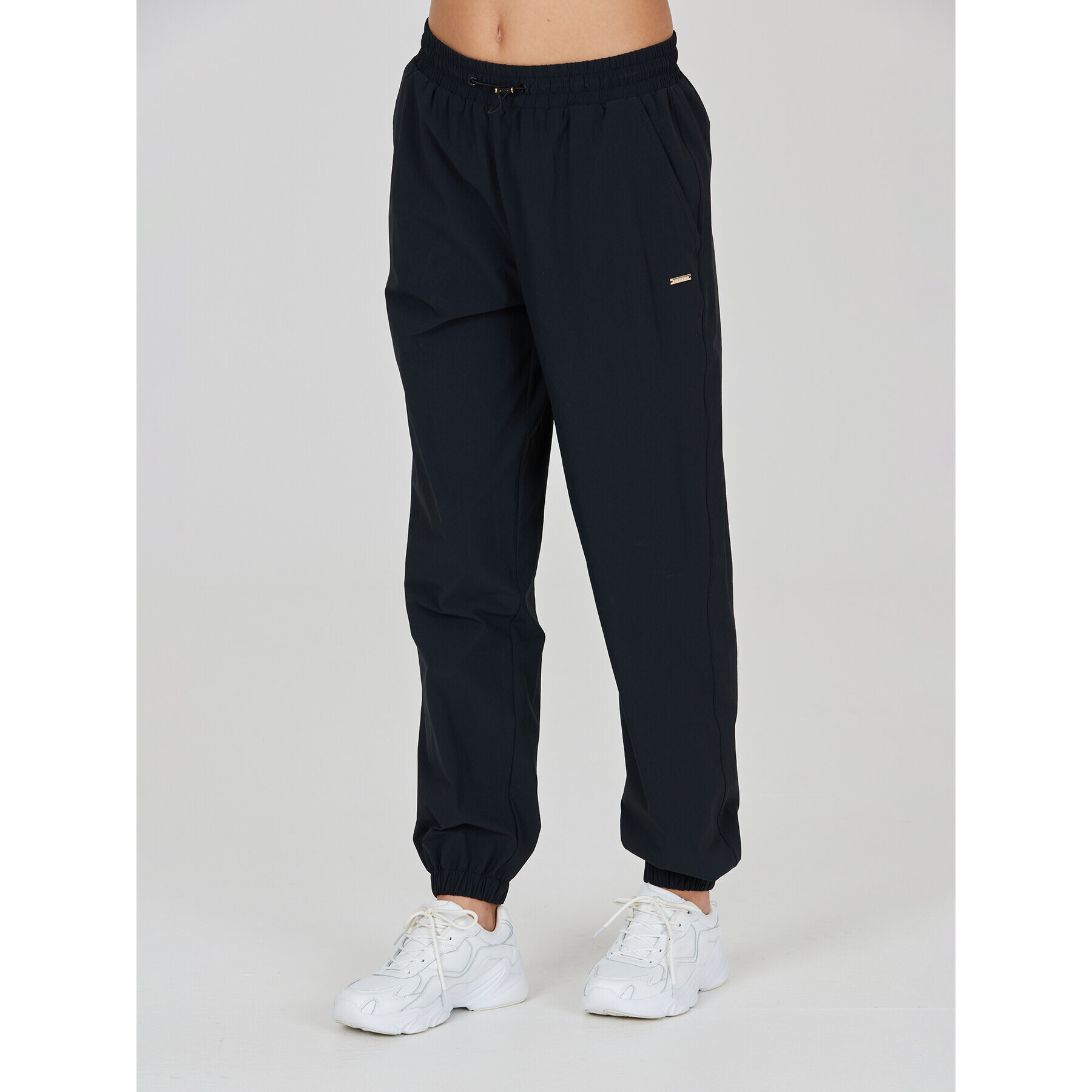 Athlecia Долнище анцуг Hero W Track Pants EA233336 Черен Regular Fit - Pepit.bg