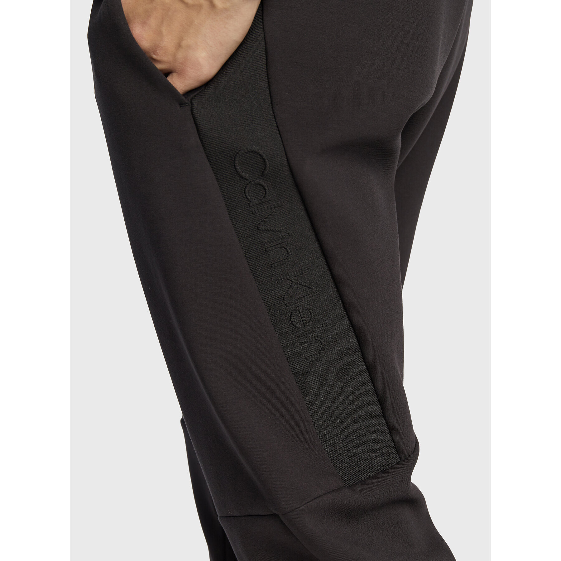 Calvin Klein Долнище анцуг Embossed Rib K10K110880 Черен Relaxed Fit - Pepit.bg