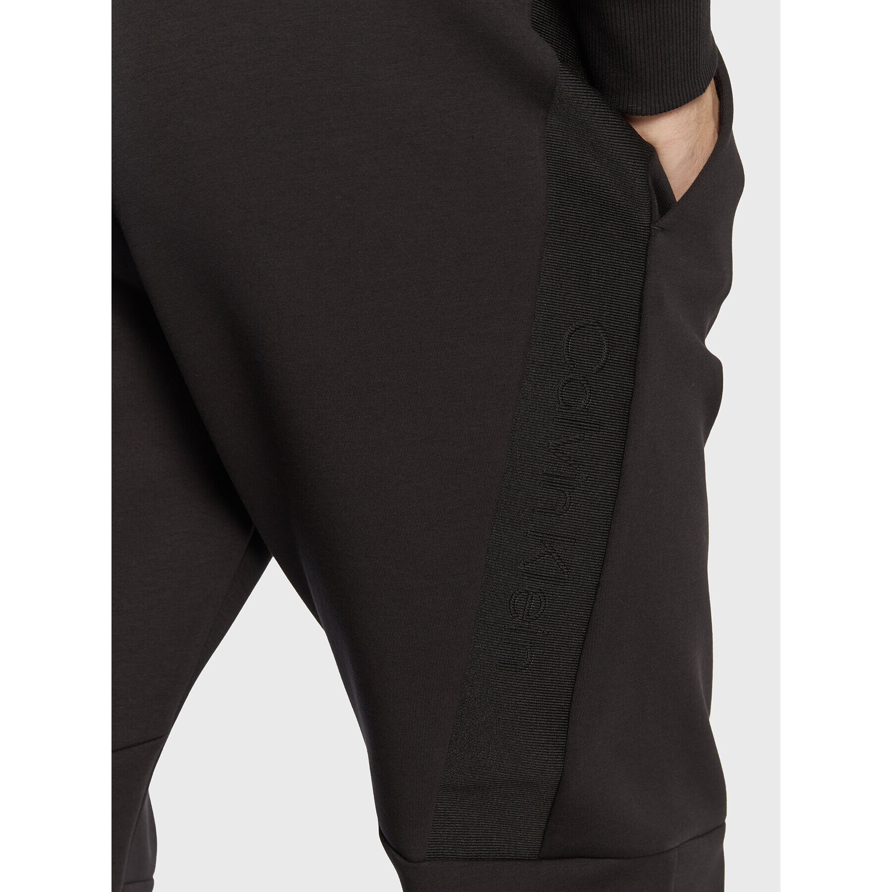 Calvin Klein Долнище анцуг Embossed Rib K10K110880 Черен Relaxed Fit - Pepit.bg