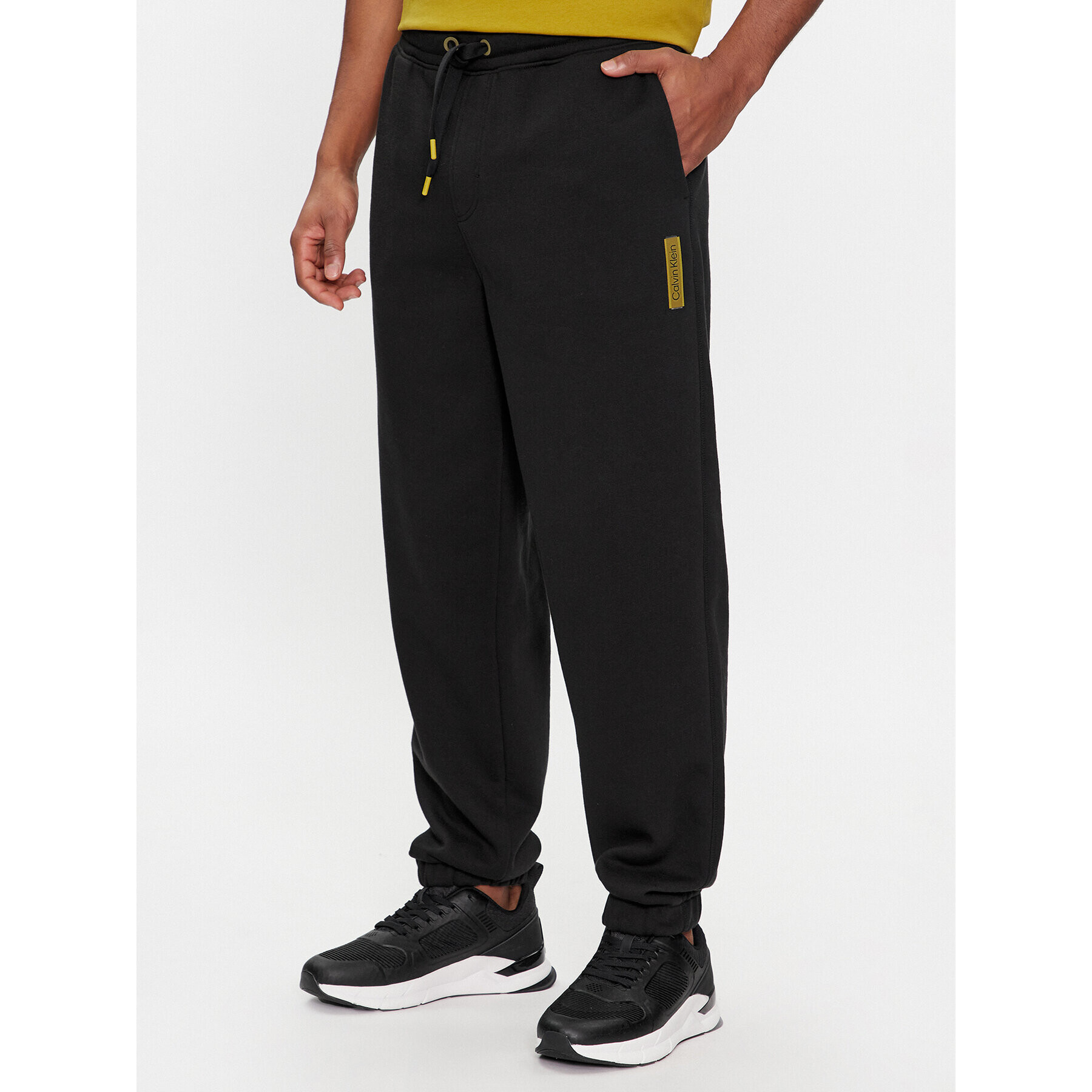 Calvin Klein Долнище анцуг Grid Logo K10K112430 Черен Relaxed Fit - Pepit.bg