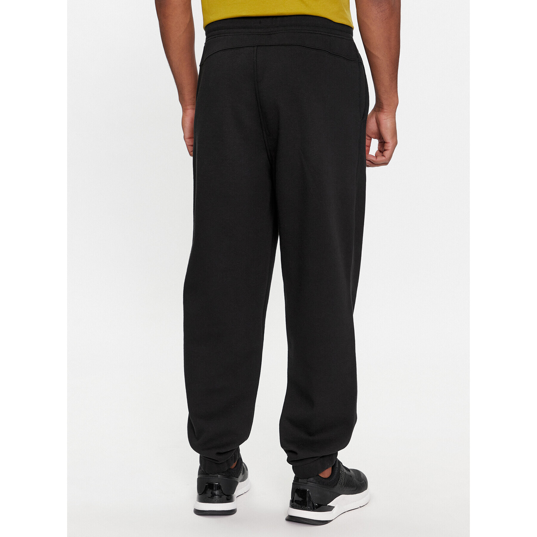 Calvin Klein Долнище анцуг Grid Logo K10K112430 Черен Relaxed Fit - Pepit.bg