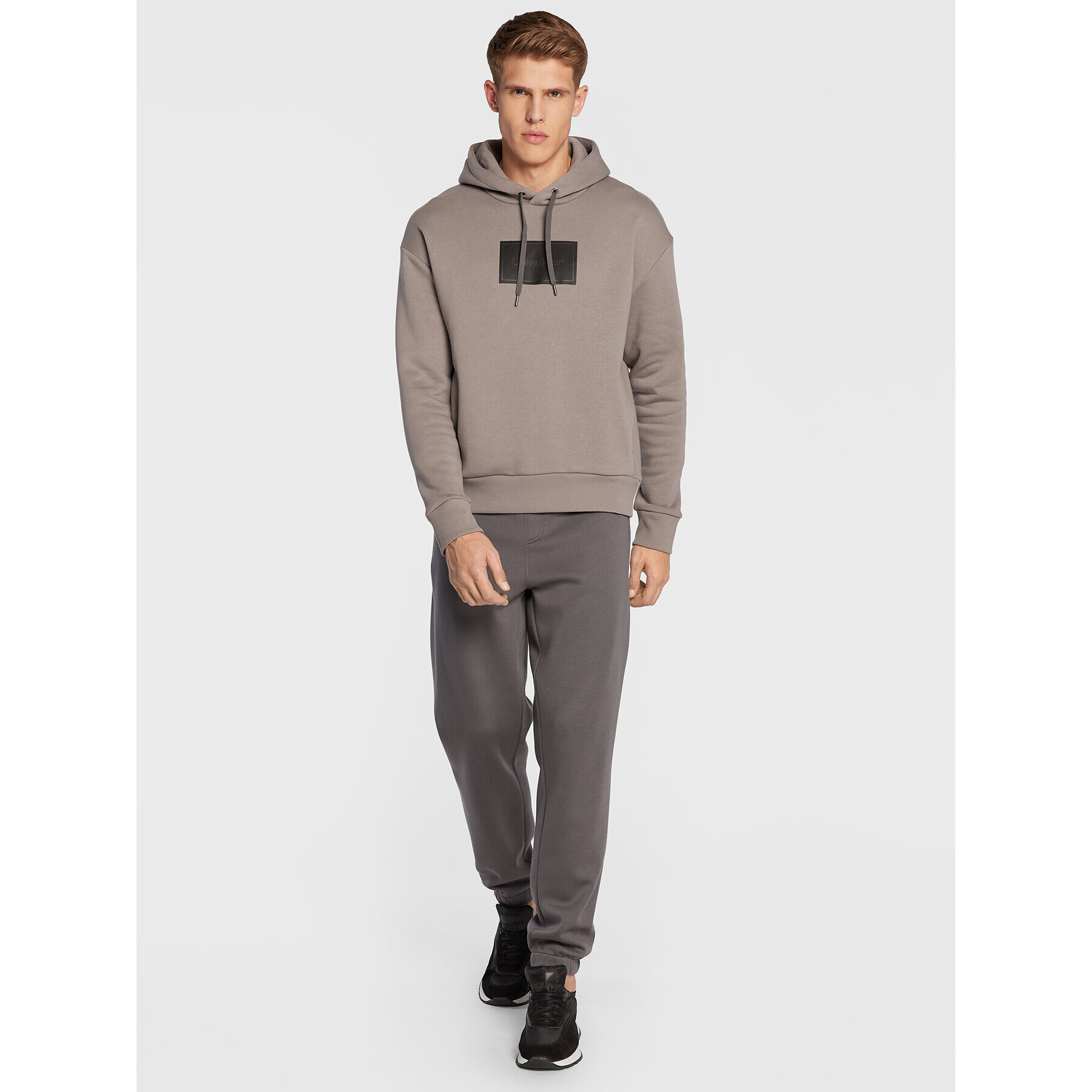 Calvin Klein Долнище анцуг Iconic K10K110196 Сив Relaxed Fit - Pepit.bg