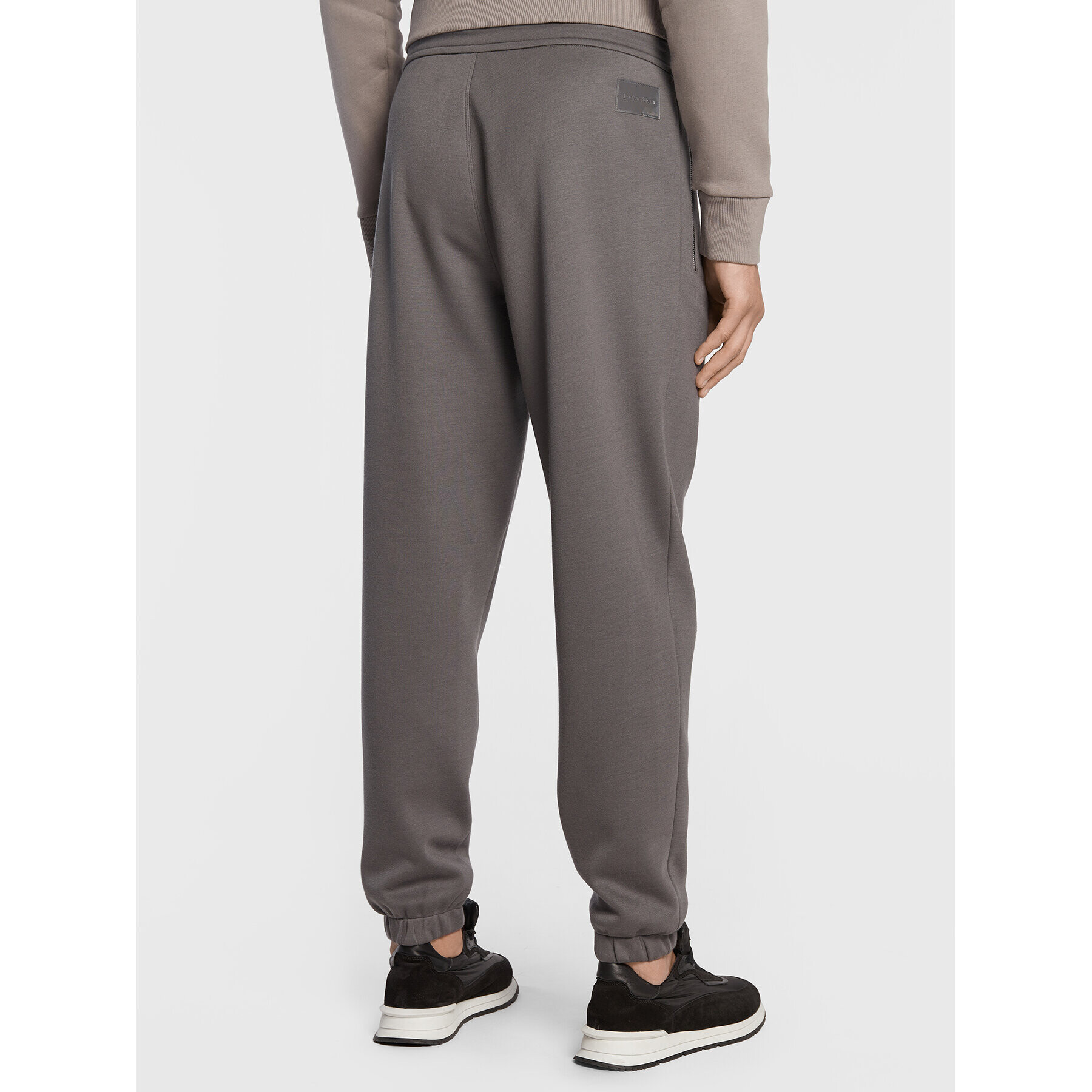 Calvin Klein Долнище анцуг Iconic K10K110196 Сив Relaxed Fit - Pepit.bg