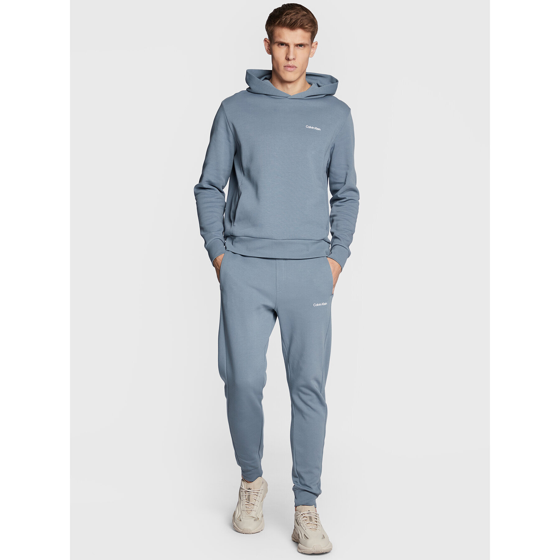 Calvin Klein Долнище анцуг Micro Logo K10K109940 Сив Relaxed Fit - Pepit.bg