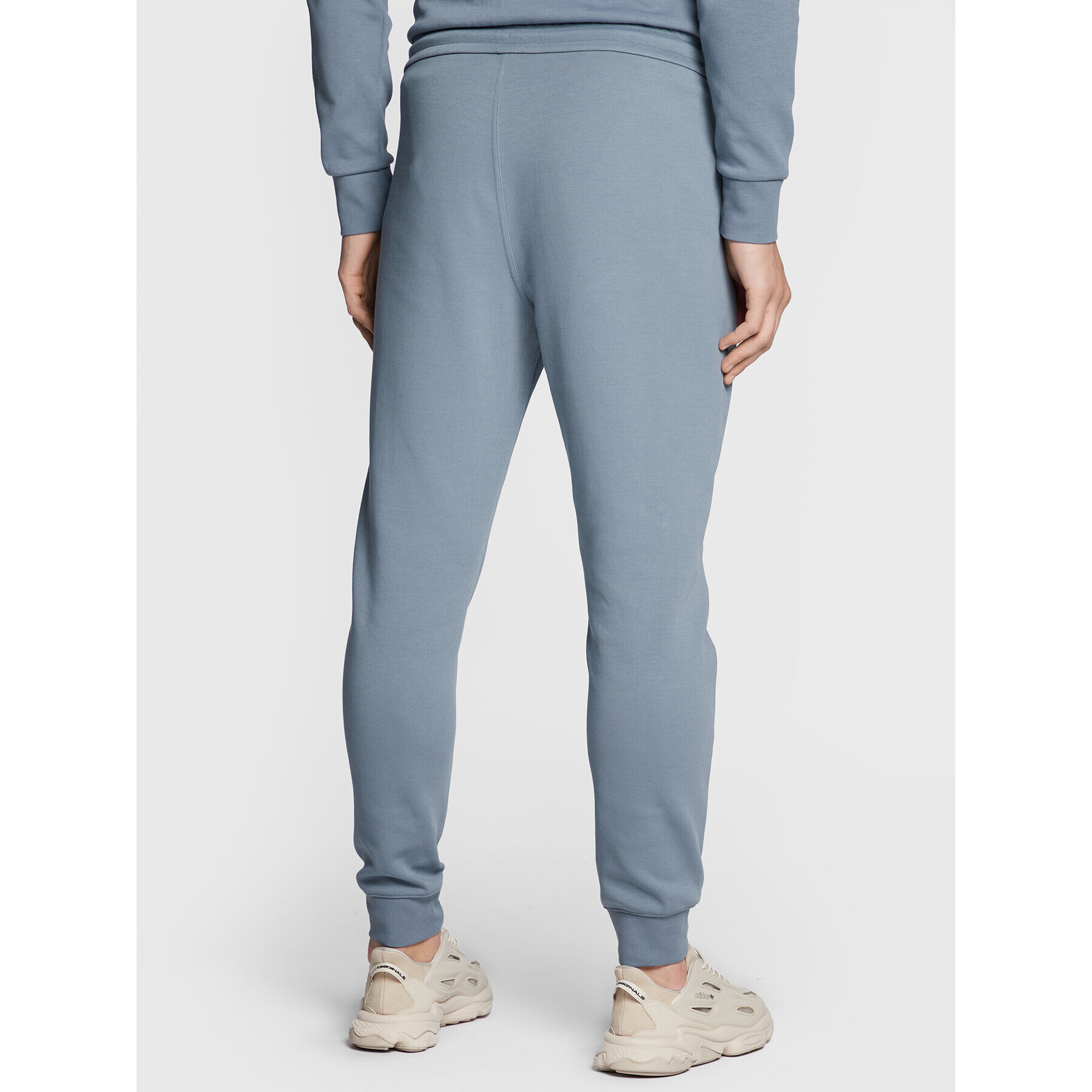 Calvin Klein Долнище анцуг Micro Logo K10K109940 Сив Relaxed Fit - Pepit.bg