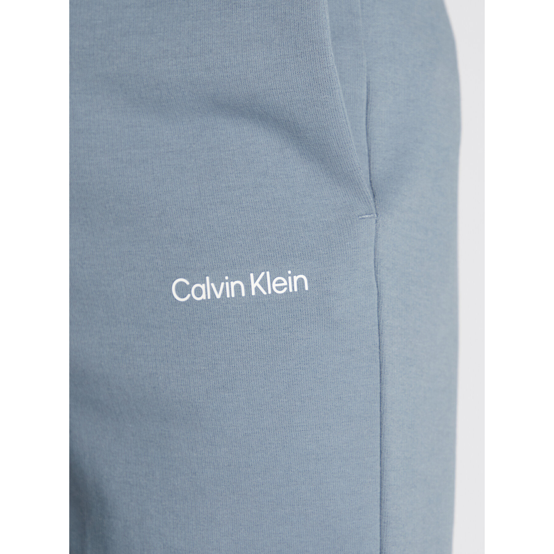 Calvin Klein Долнище анцуг Micro Logo K10K109940 Сив Relaxed Fit - Pepit.bg