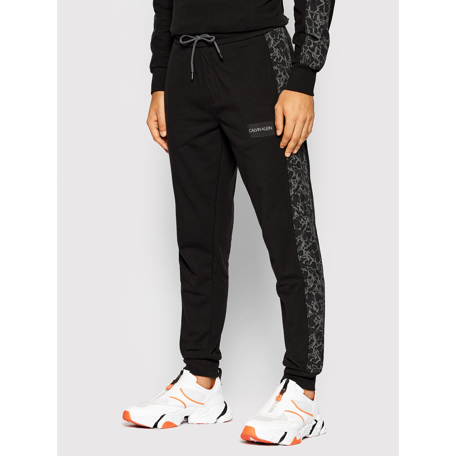 Calvin Klein Долнище анцуг Reflective Print K10K107320 Черен Regular Fit - Pepit.bg