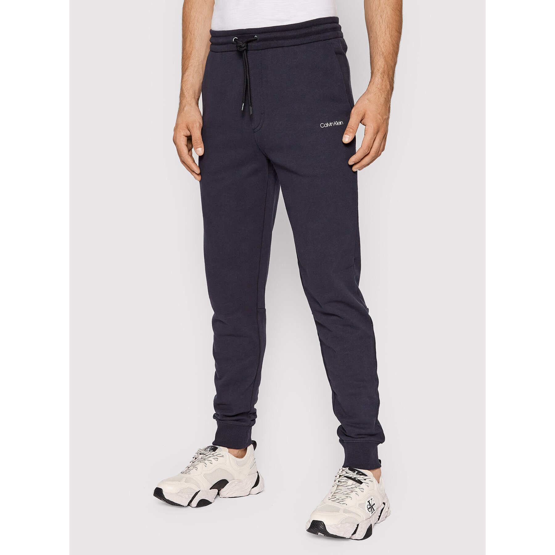 Calvin Klein Долнище анцуг Small Logo K10K107954 Тъмносин Regular Fit - Pepit.bg