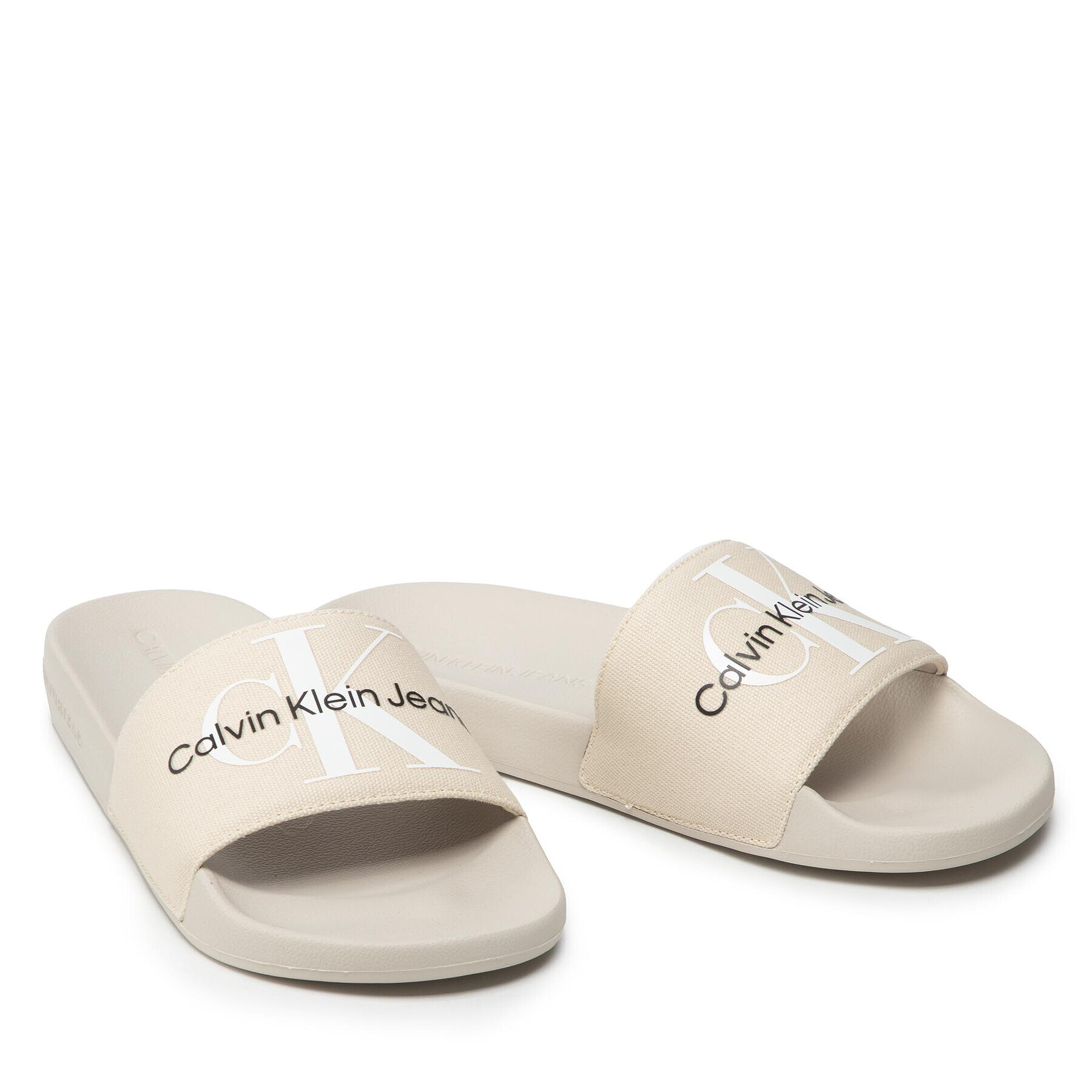 Calvin Klein Jeans Чехли Slide Monogram Co YM0YM00061 Бежов - Pepit.bg