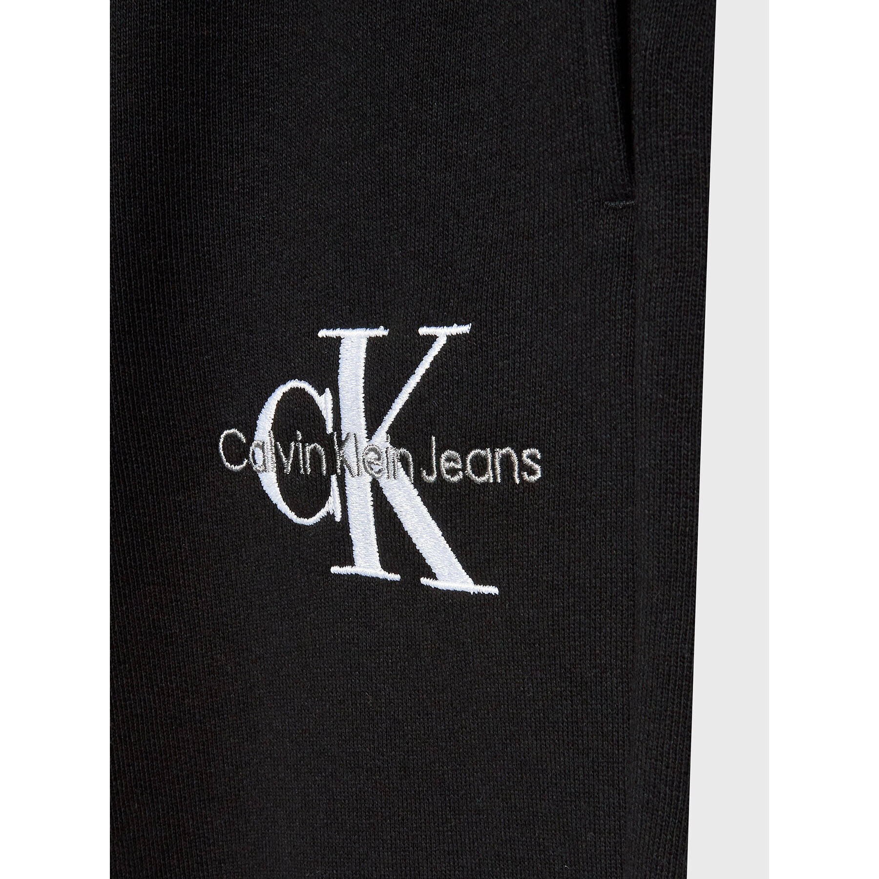 Calvin Klein Jeans Долнище анцуг Monogram Off Placed IG0IG01607 Черен Regular Fit - Pepit.bg