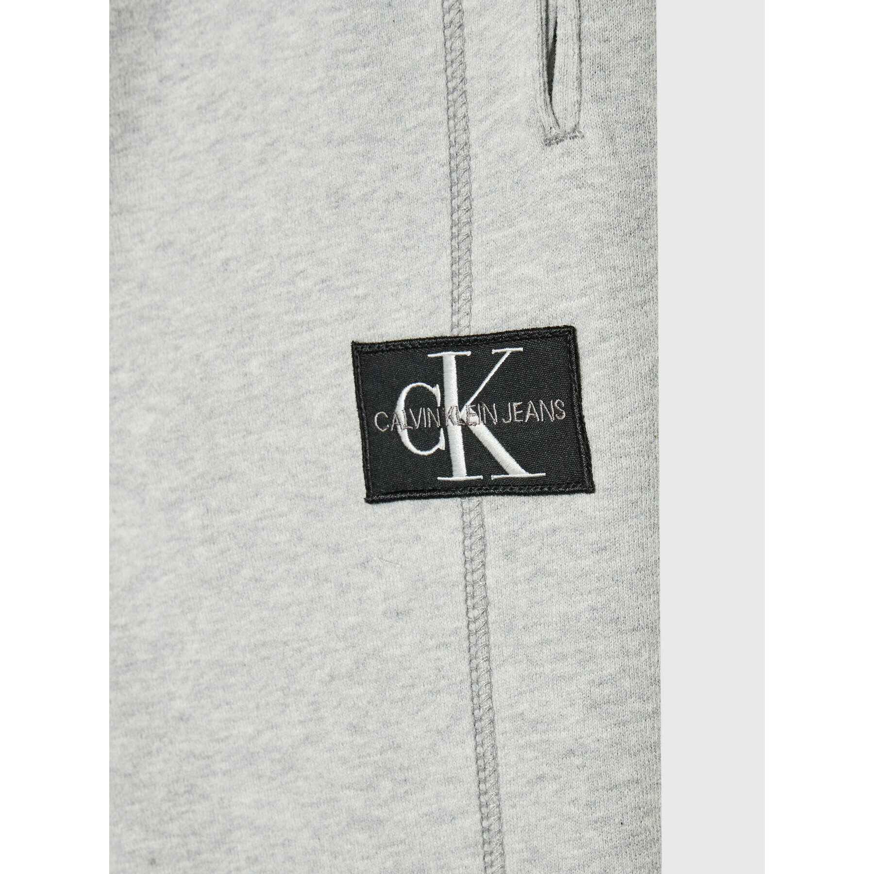 Calvin Klein Jeans Долнище анцуг Rib Blocking Badge IB0IB00715 Сив Regular Fit - Pepit.bg