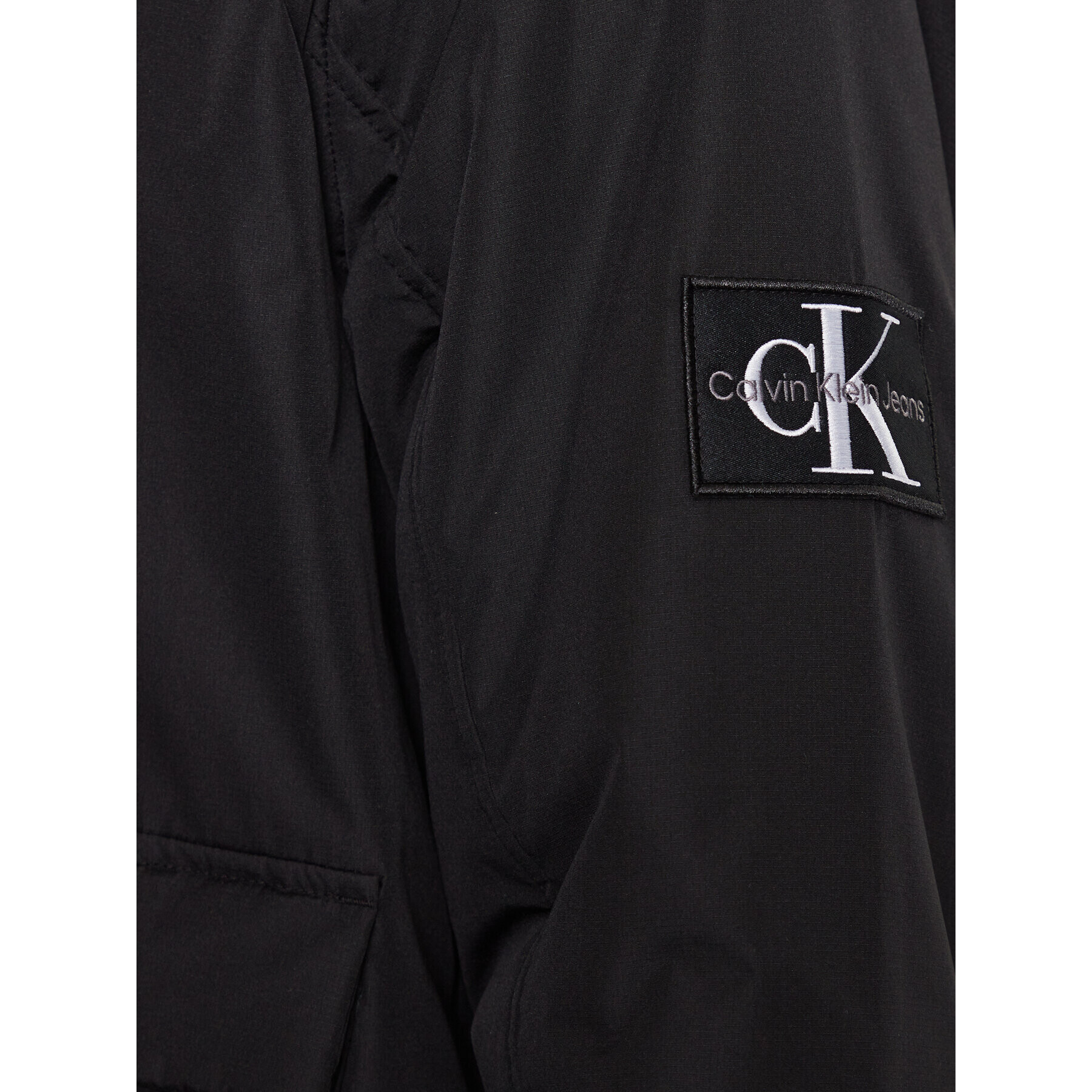 Calvin Klein Jeans Преходно яке J30J323467 Черен Regular Fit - Pepit.bg