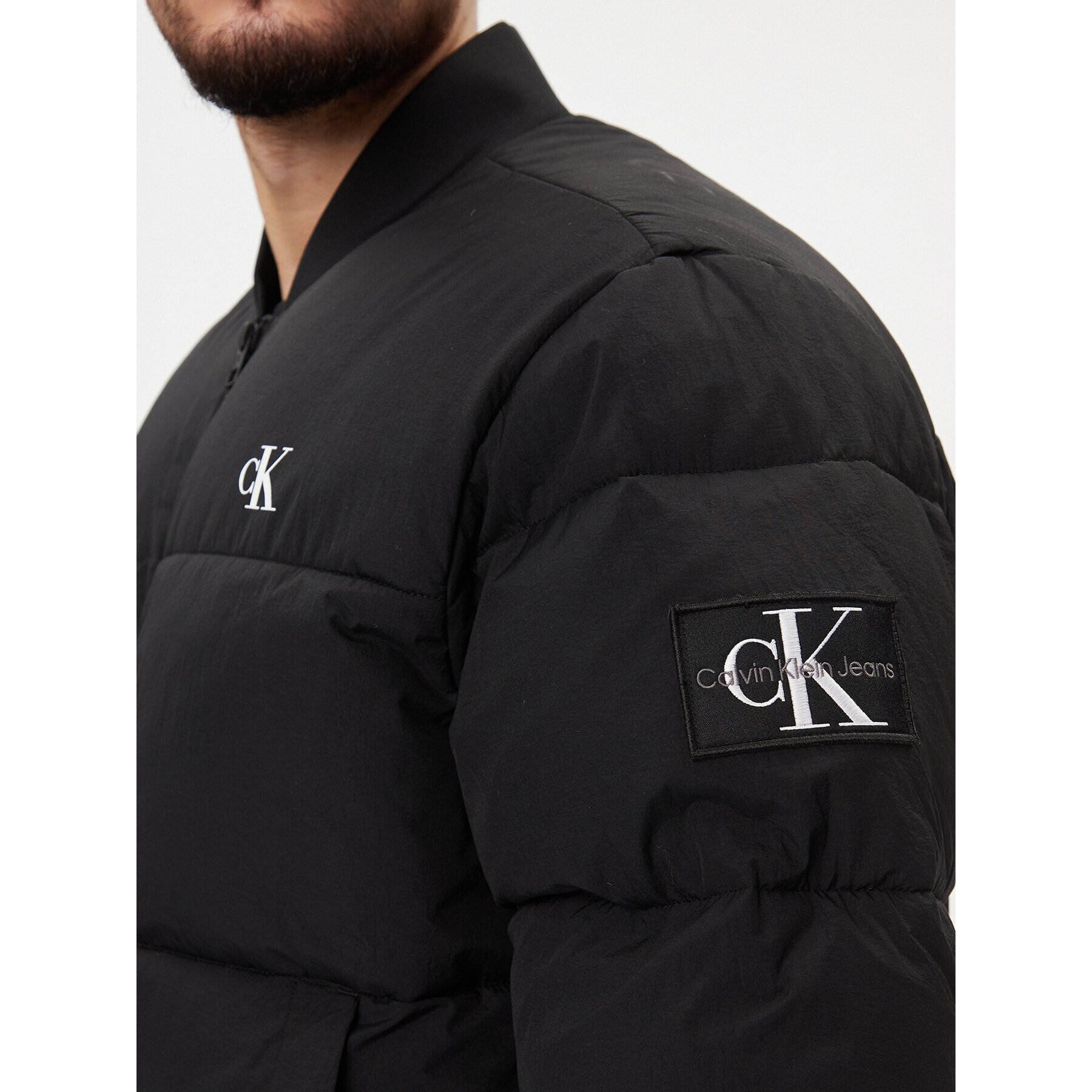 Calvin Klein Jeans Пухено яке J30J324072 Черен Regular Fit - Pepit.bg